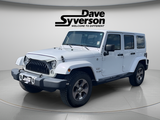 2018 Jeep Wrangler JK Unlimited Sahara in Bright White Clearcoat — front three-quarter view