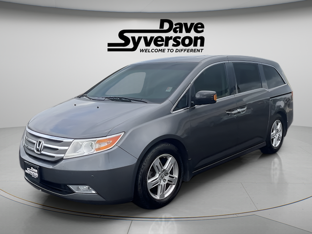 2012 Honda Odyssey Touring in Gray — front three-quarter view